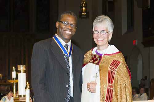 Moses Kajoba receiving the ODNW award in 2014