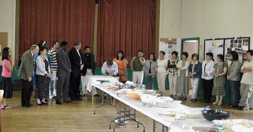 People lining up for potluck
