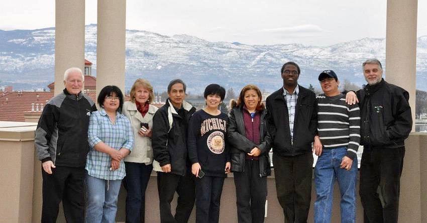 Group photo in front of mountains