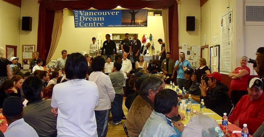 People gathered to eat in the church hall