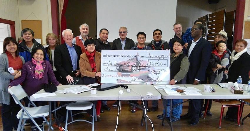 Group photo with giant cheque