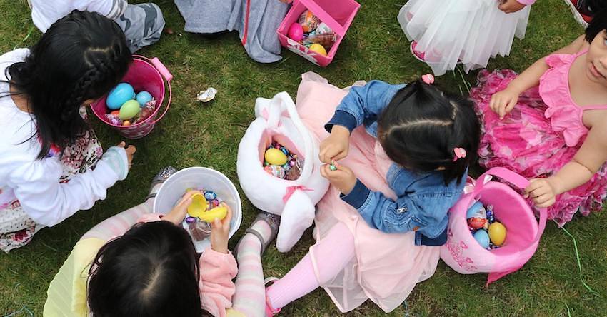 Children eating Easter chocolates
